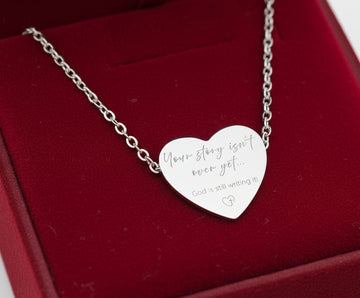 Engraved Heart Necklace "Your story isn't over yet...God is still writing it!