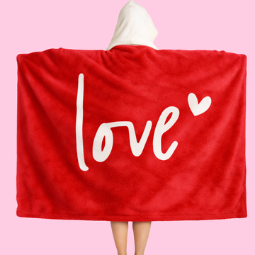 This premium hooded blanket is soft, oversized, and beautifully designed with a simple message of love. It’s warmth you can feel. Quality you can see. Meaning you can cherish.